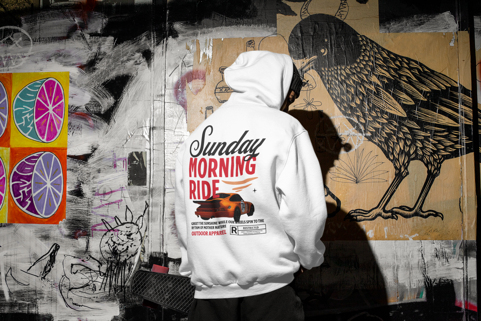 mockup-of-the-back-of-a-man-wearing-a-hoodie-in-a-dark-urban-scenario-m567.png