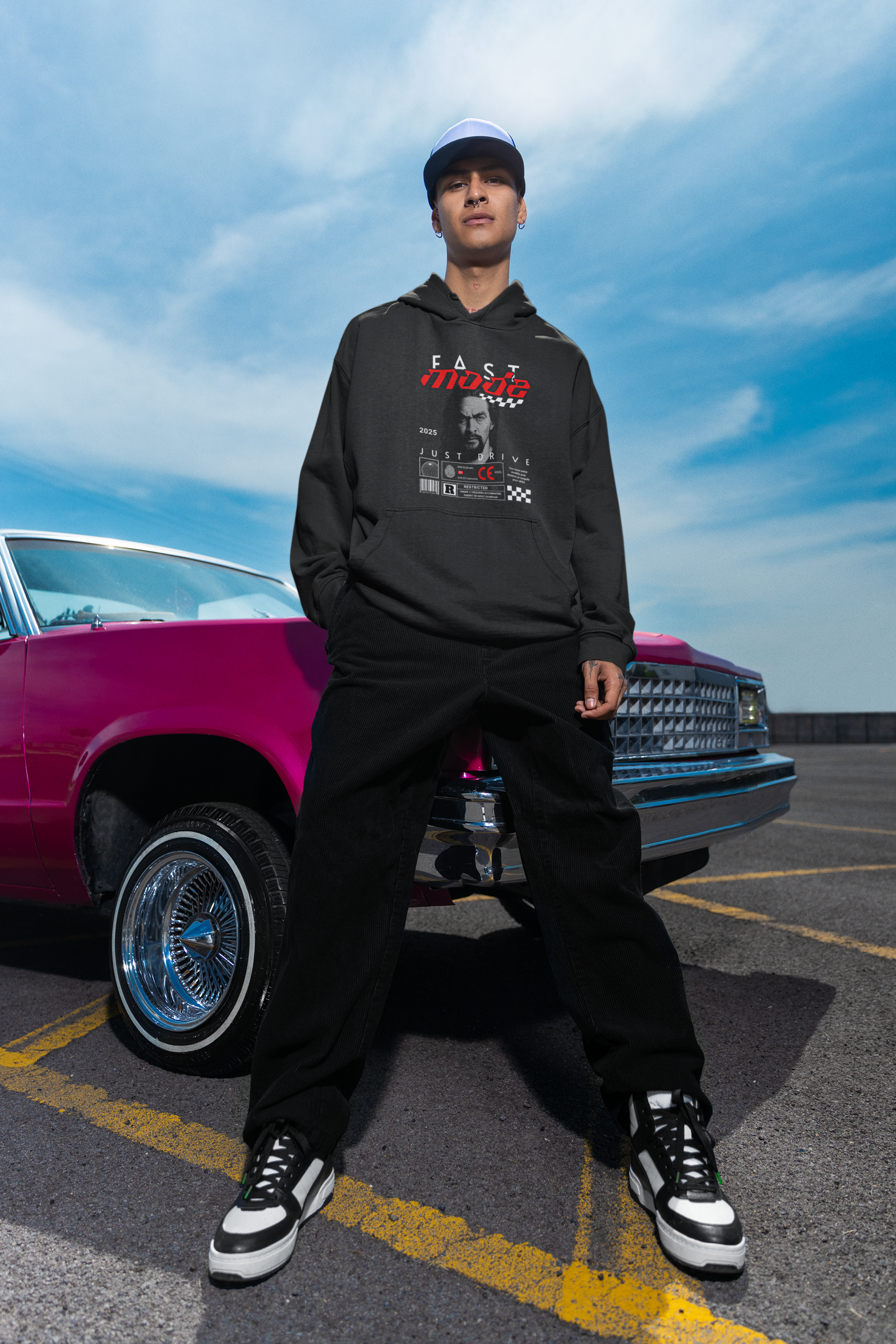 pullover-hoodie-mockup-featuring-a-serious-man-posing-near-a-car-m36825.png